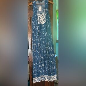 Brand new summer sleeveless, floral Maxi dress.  Pretty and flowing.